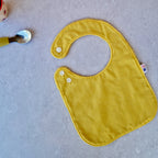 Bavoir jaune moutarde